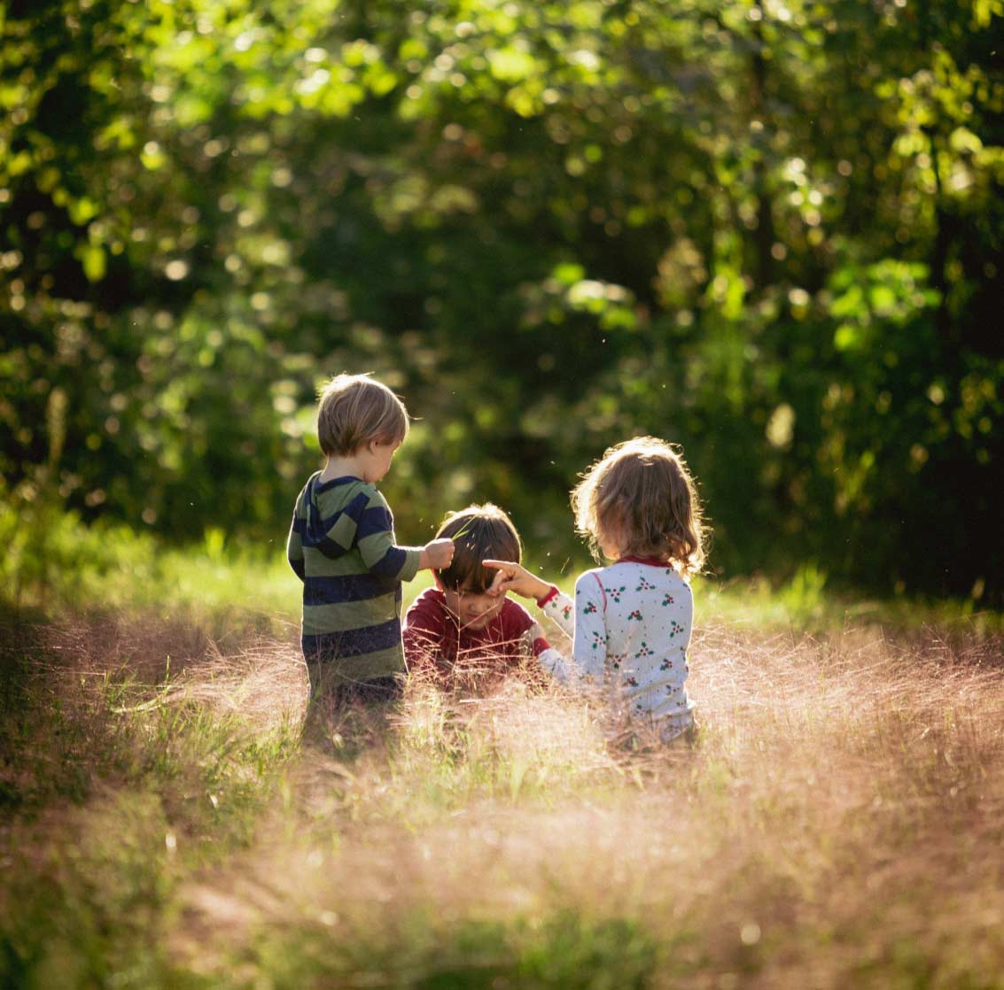children playing woodland