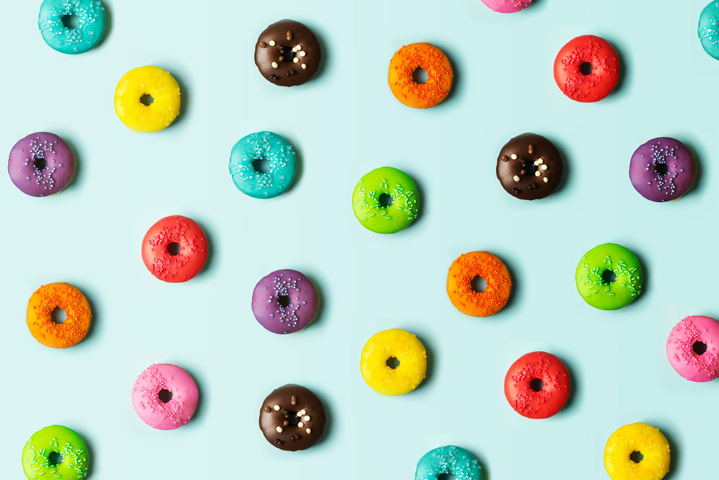 A multicoloured pattern of donuts